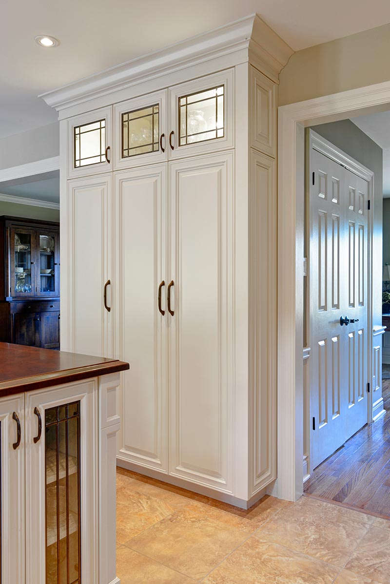 Concealed message center and key storage with cork board closed 