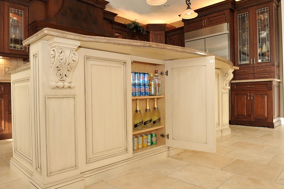 Concealed storage with touch latch doors